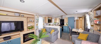 Spacious and modern 12ft-wide caravan with one double and two twin.