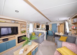 Living area - Spacious and modern 12ft-wide caravan with one double and two twin. (New Quay)