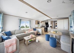 Living area - Spacious and modern 12ft-wide caravan with one double and two twin. (New Quay)