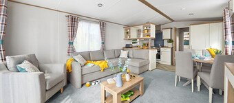 Spacious and modern 12ft-wide caravan with one double and two twin.