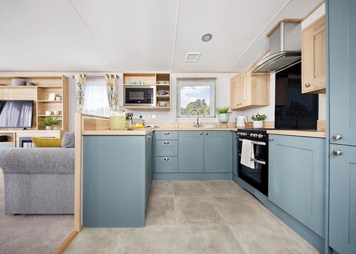 Spacious and modern 12ft-wide caravan with one double and two twin.