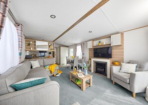 Unclassified image, 2 of 8, button - Spacious and modern 12ft-wide caravan with one double and two twin. (New Quay)