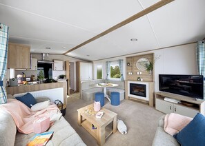 Unclassified image, 3 of 8, button - Spacious and modern 12ft-wide caravan with one double and two twin. (New Quay)