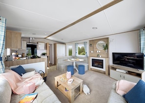 Living area - Spacious and modern 12ft-wide caravan with one double and two twin. (New Quay)