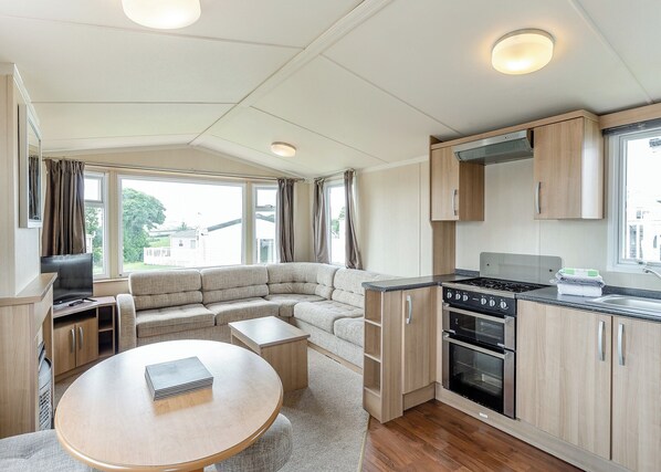 Living area - Comfortable spacious caravan with one double and two twin. (Nr St Austell)
