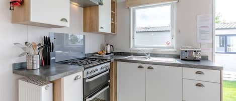 Refrigerador, horno, parrilla de estufa y lavavajillas