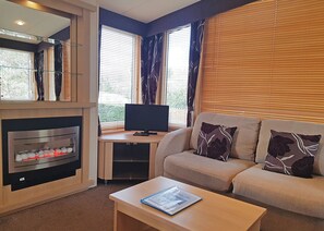 TV - Stylish caravan with one double and one twin. (Saundersfoot)
