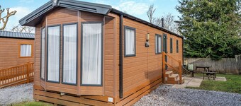 This contemporary caravan features one master double bedroom with two W.