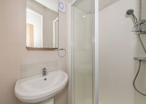Bathroom - This contemporary caravan features one master double bedroom with two W. (Woodbury)
