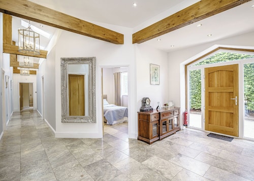 Modern spacious barn conversion with stylish finish.