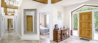 Modern spacious barn conversion with stylish finish.