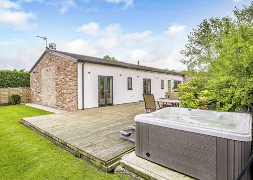 Modern spacious barn conversion with stylish finish.