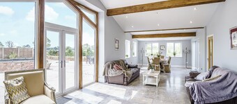 Modern spacious barn conversion with stylish finish.