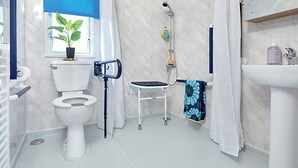 Bathroom - 12ft-wide caravan with two twin. (Milford-on-Sea, Nr Lymington)
