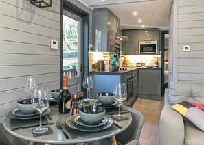 Dining - Superb contemporary one bedroom lodge with one double. (Snowdonia)