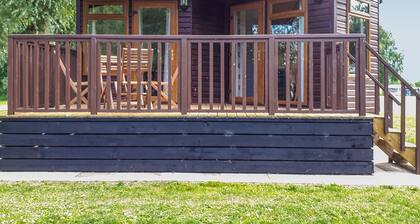 Modern two bedroom lodge, one double and one twin with en suite shower.