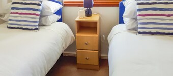 Modern two bedroom lodge, one double and one twin with en suite shower.