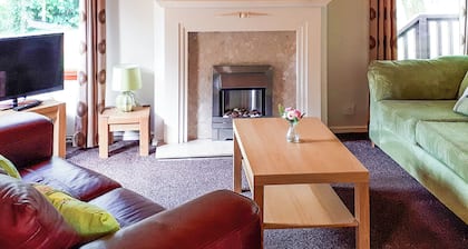 Modern two bedroom lodge, one double and one twin with en suite shower.