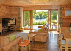 Living area - Perfectly positioned with panoramic views of the lake. (Anglesey)