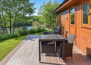 Outdoor dining - Perfectly positioned with panoramic views of the lake. (Anglesey)