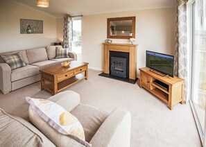 Living area - Contemporary lodge furnished to a very high standard. (Tunstall, Nr Hull)