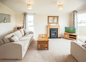 Living area - Contemporary lodge furnished to a very high standard. (Tunstall, Nr Hull)