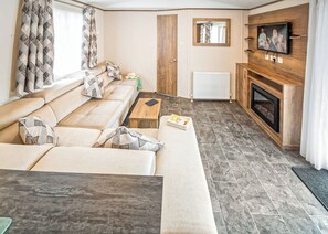 Living area - New in 2017. Luxury 12ft-wide caravan. (Milford-on-Sea, Nr Lymington)