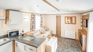 Living area - New in 2017. Luxury 12ft-wide caravan. (Milford-on-Sea, Nr Lymington)