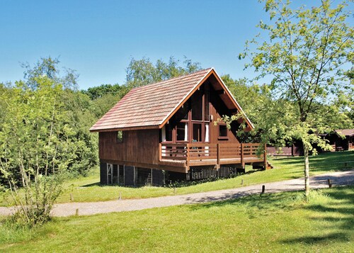 Single storey A-frame lodge.
