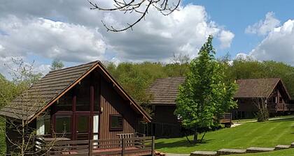 Single storey A-frame lodge.