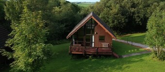 Single storey A-frame lodge.