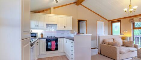 Frigorífico, horno, placa de cocina y tostadora