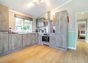 Fridge, oven, stovetop, dishwasher - Luxury boutique style lodge with one double bedroom and one twin bedroom. (Beetley, Dereham)