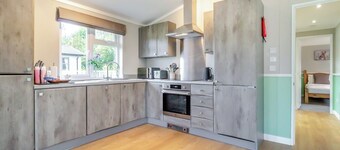 Luxury boutique style lodge with one double bedroom and one twin bedroom.
