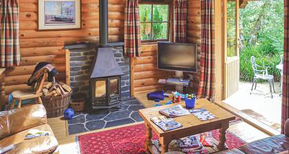 Luxury lodge with king-size four poster and child size single.