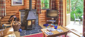 Luxury lodge with king-size four poster and child size single.