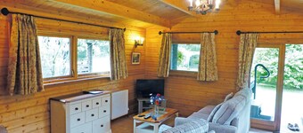 Timber lodge with one queen size double and one twin.