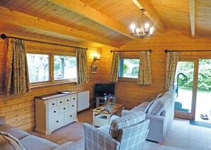 Living area - Timber lodge with one queen size double and one twin. (Kentisbeare, Nr Cullompton)