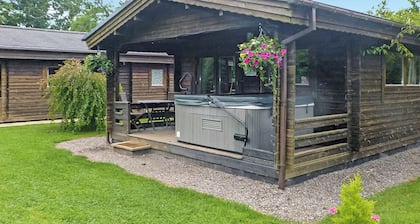 Timber lodge with one queen size double and one twin.