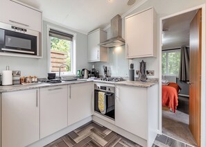 Refrigerador, horno, parrilla de estufa y tostadora 