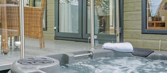 Shepherd’s Hut with an open plan design with king-size bed.