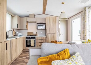 Interior - Modern, stylish and spacious 12ft-wide caravan with one double and two twin. (Selsey, Chichester)