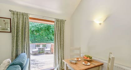 Lodge with one king-size double with en suite shower.