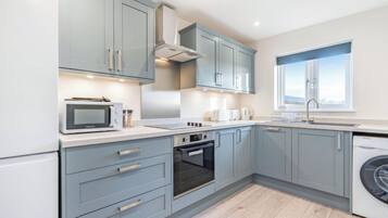 Fridge, toaster, cookware/dishes/utensils