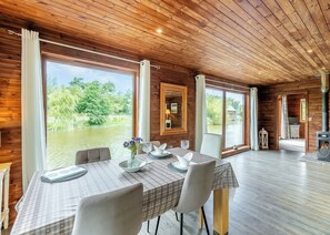 Dining - Superb lodge perched on the lake, perfect for romantic breaks. (Anglesey)