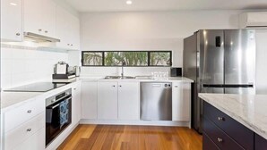 Coffee/tea maker, fridge, microwave, oven