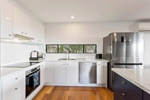 Coffee/tea maker, fridge, microwave, oven