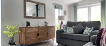 Experience the ultimate retreat in this stunning woodland lodge.