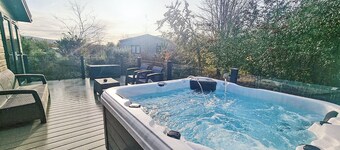 Experience the ultimate retreat in this stunning woodland lodge.