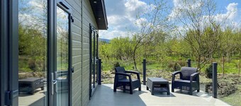 Experience the ultimate retreat in this stunning woodland lodge.